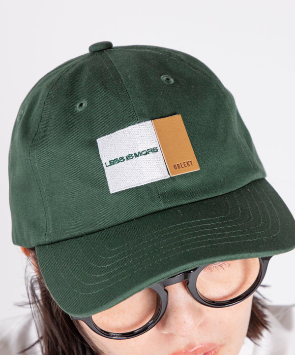 グラフィック エンブロイダリー キャップ"LESS IS MORE